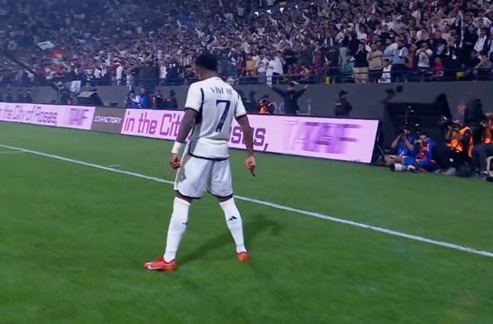 Vinicius Junior pictured performing Cristiano Ronaldo's 'SIU' celebration after scoring a goal for Real Madrid against Barcelona in the final of the Supercopa de Espana in January 2024